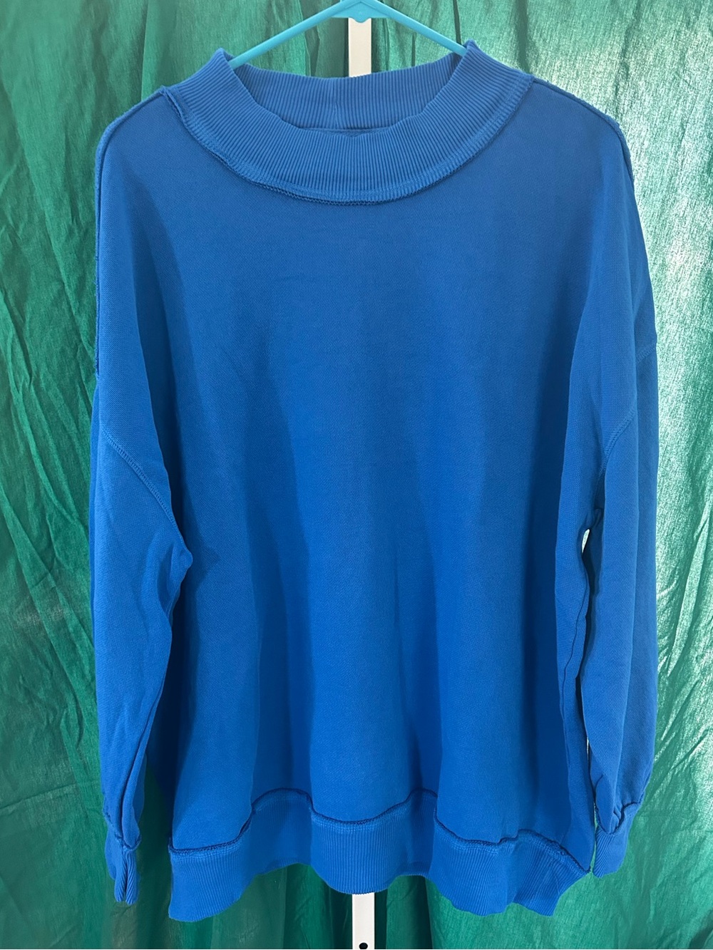 We The Free Palm Springs Pullover in the color Sapphire Princess